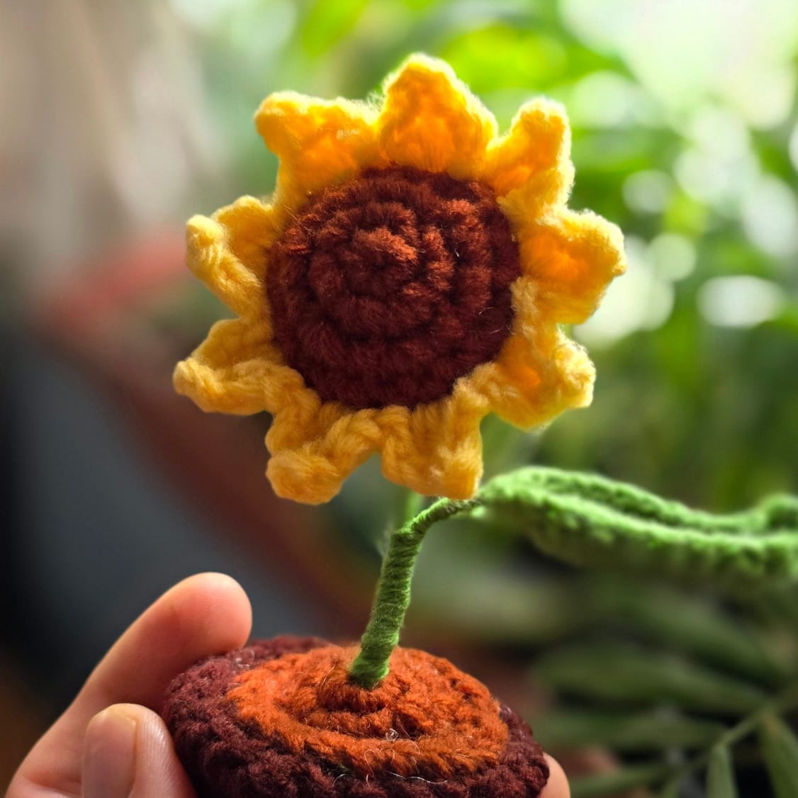 A crochet sunflower in a little pot